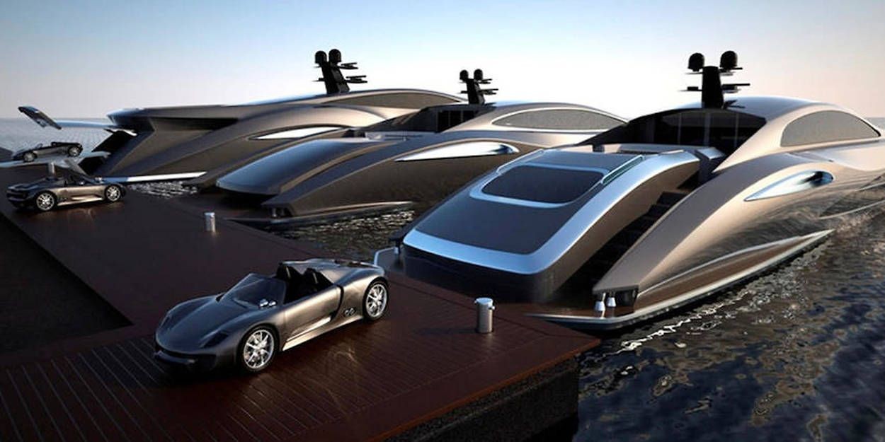 Luxury yachts and sports cars docked at a marina under clear skies.